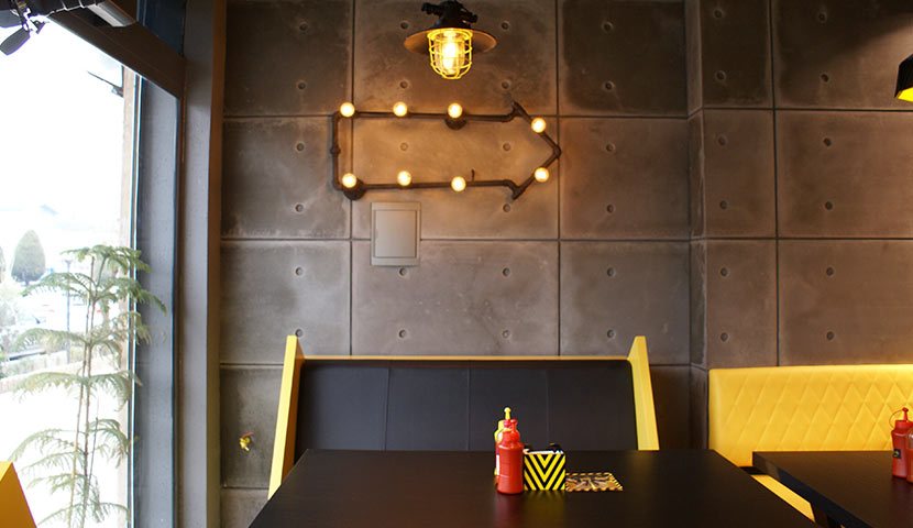 سنگ بتن اکسپوز صدر استون در نمای داخلی رستوران